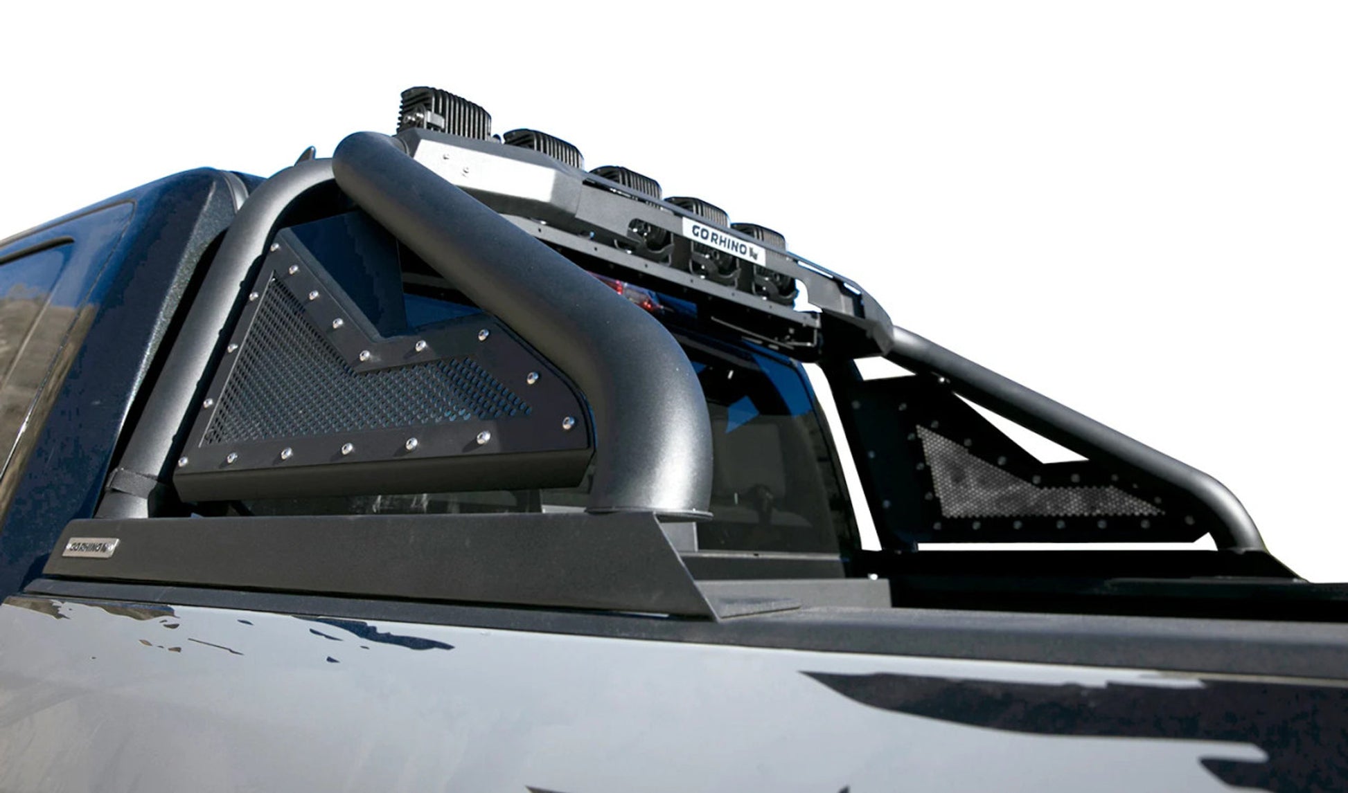Roof rack system on a vehicle with additional lights and equipment.