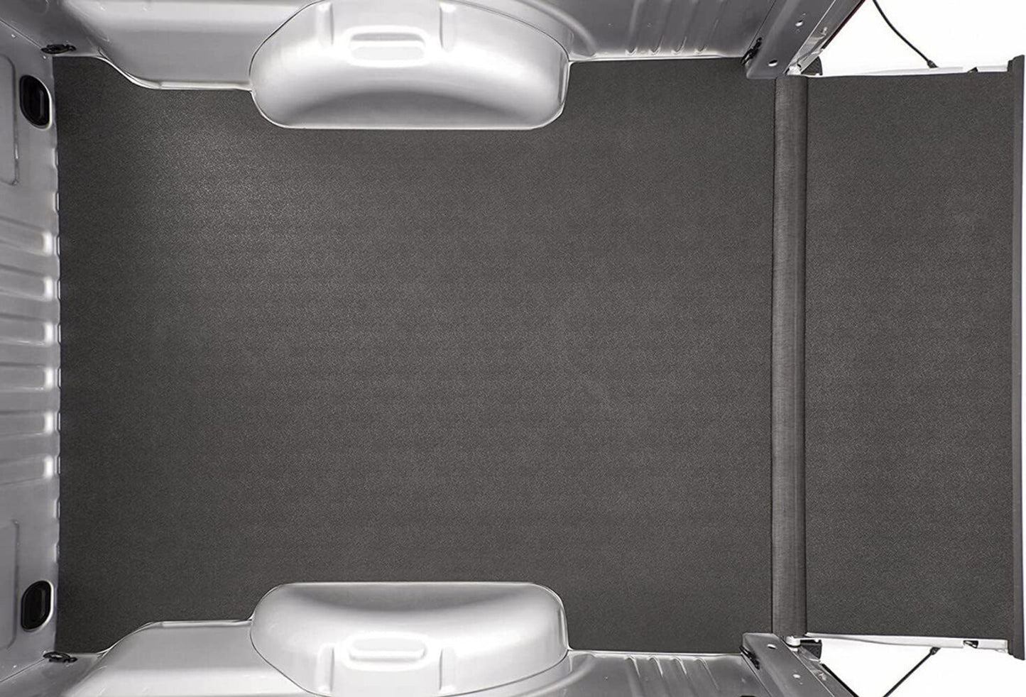 Car trunk with a gray cargo cover and a white car mat Bedrug Liner