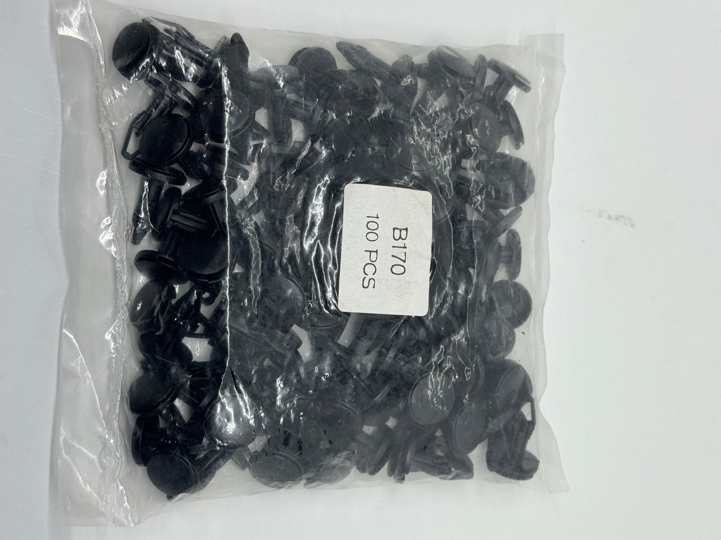 Bulk black nylon radiator cover clip for a Chevrolet Silverado 1500.