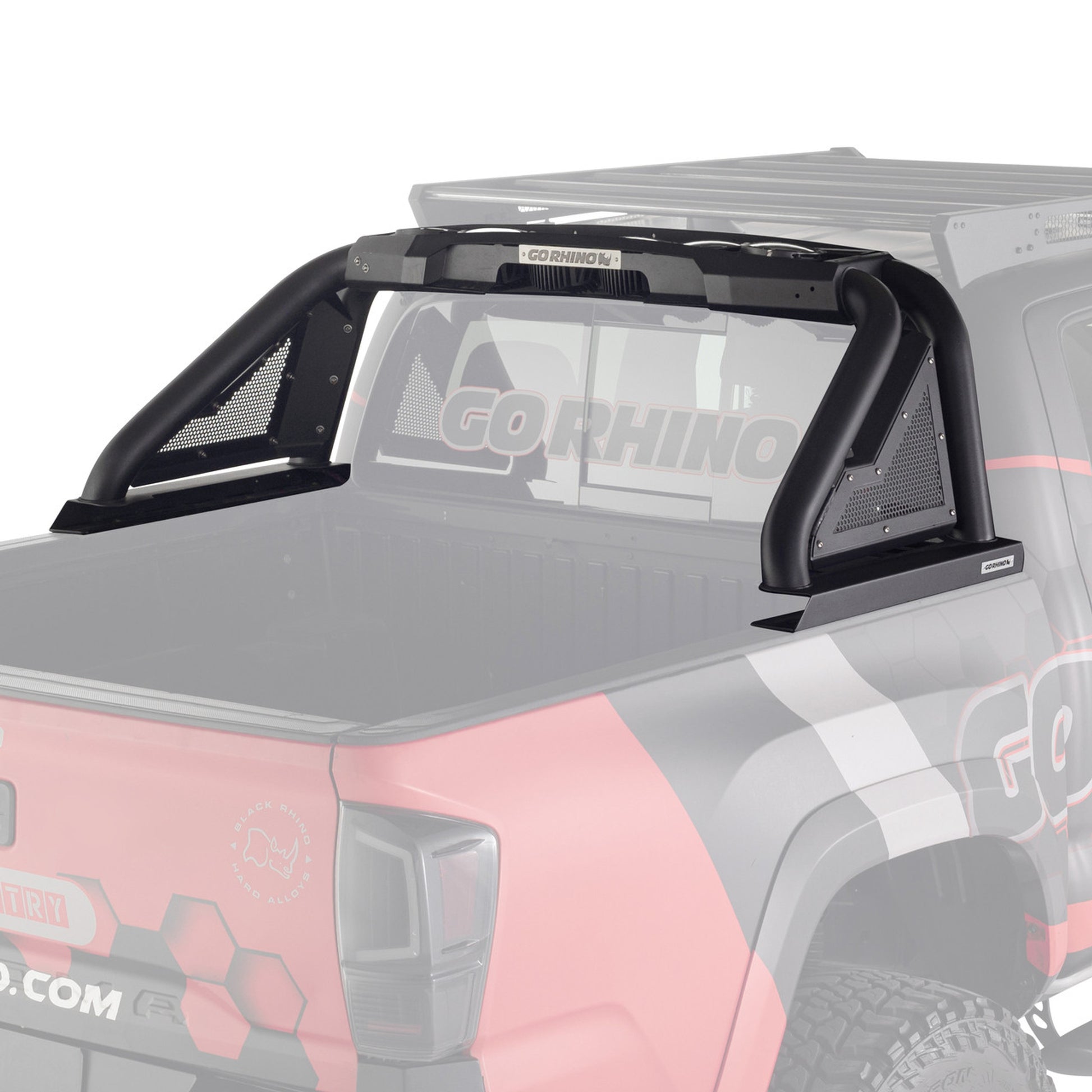 Black truck bed rack on a vehicle with 'Go Rhino' branding.