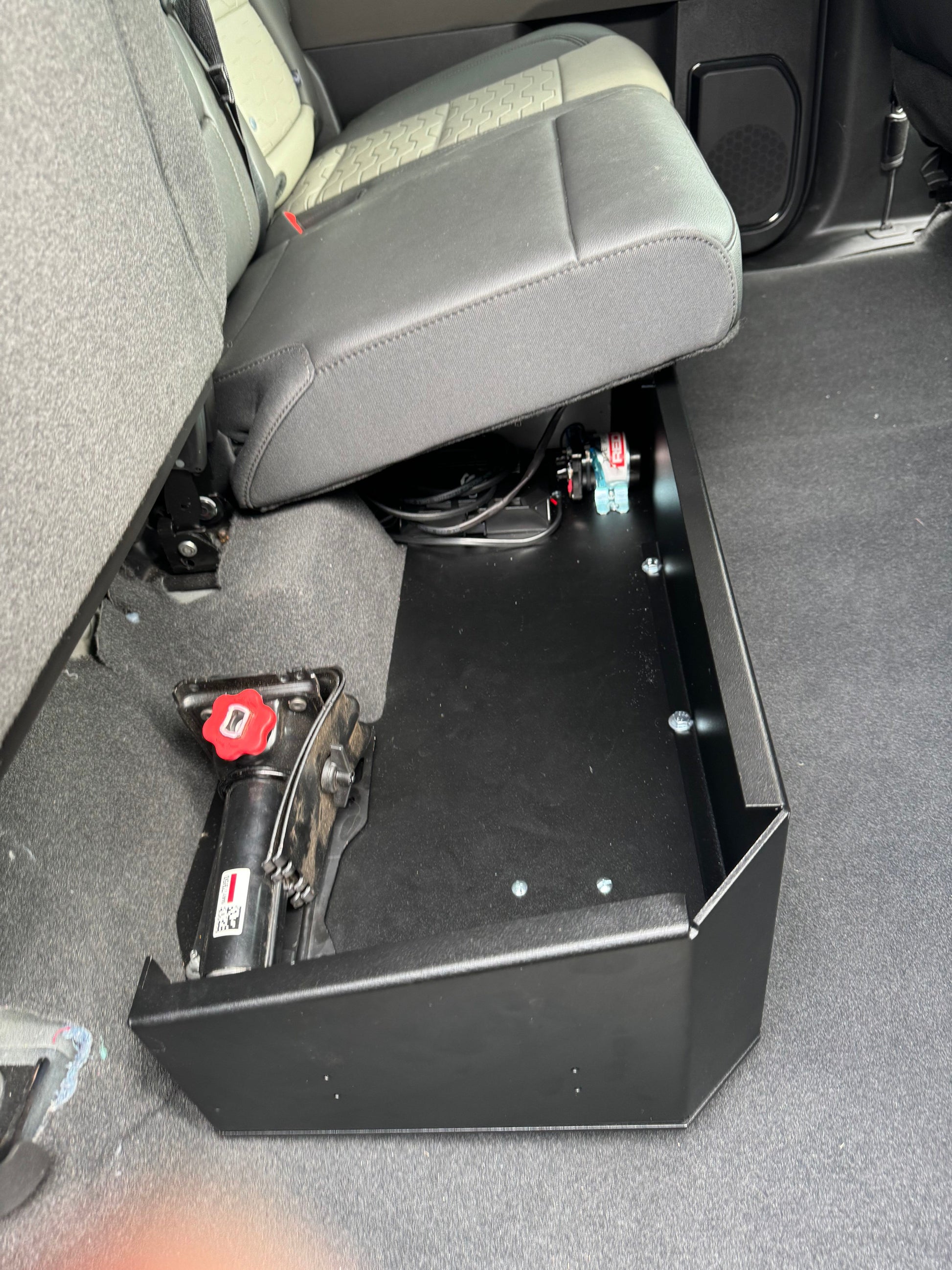Complete Vehicle Designs under seat storage unit in Chevrolet Silverado 2019+ with DCS Lithium Battery & RedArc BCDC1250D