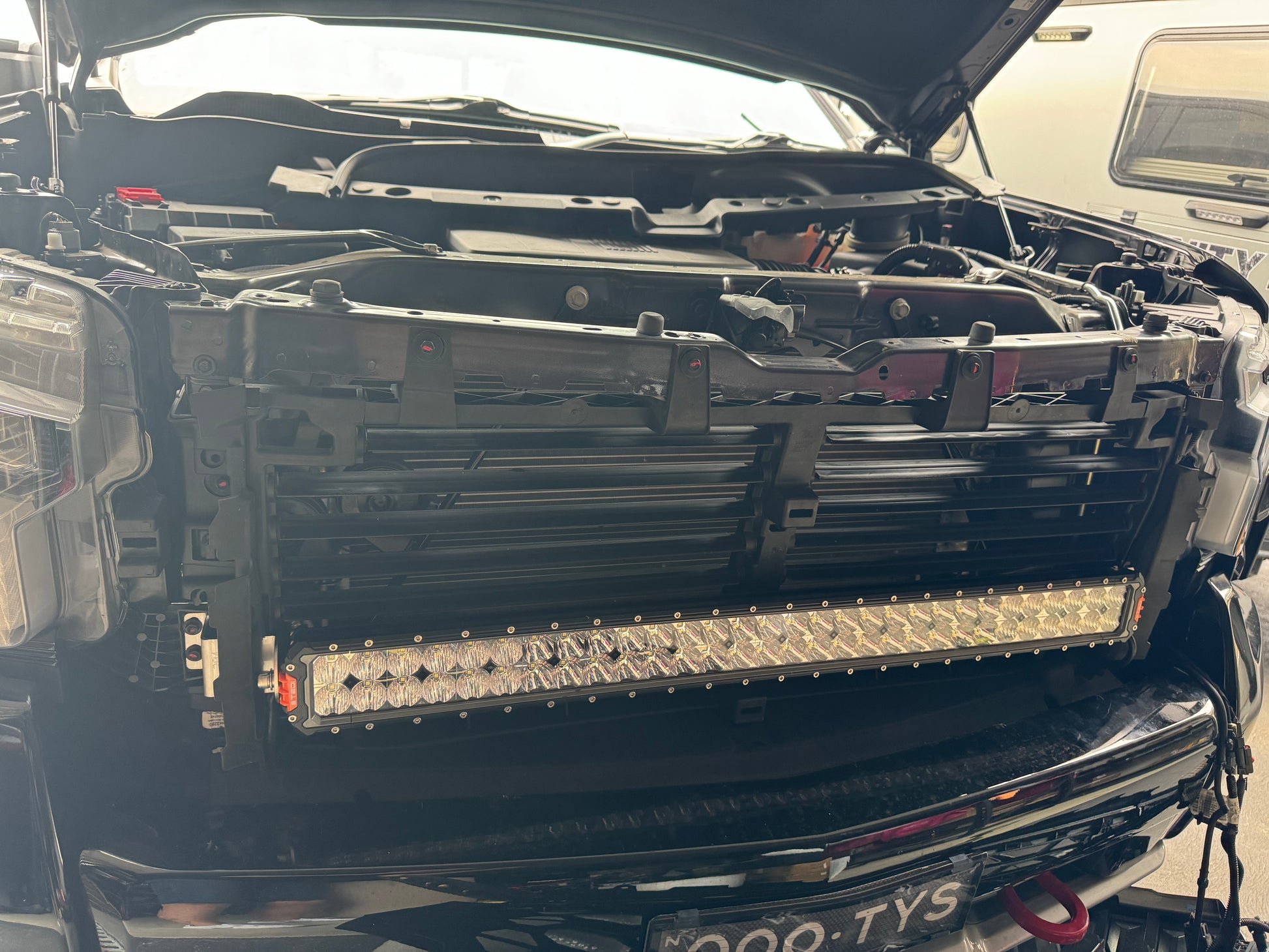 Silverado ZR2 behind Grill light Bar Brackets fitted with Stedi ST3303 Pro 39 Light Bar with grill open