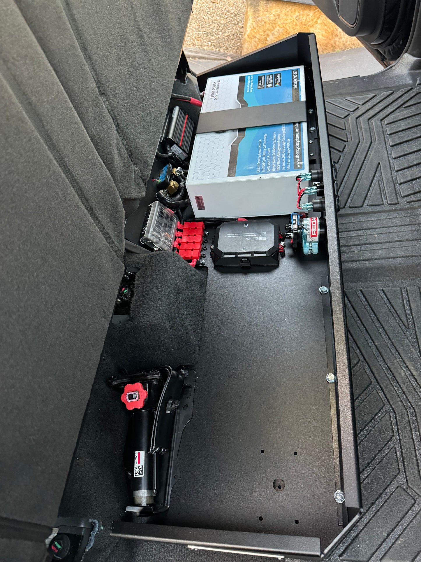 Complete Vehicle Designs under seat storage unit in Chevrolet Silverado 2019+ with Redarc Charger & DCS Lithium battery