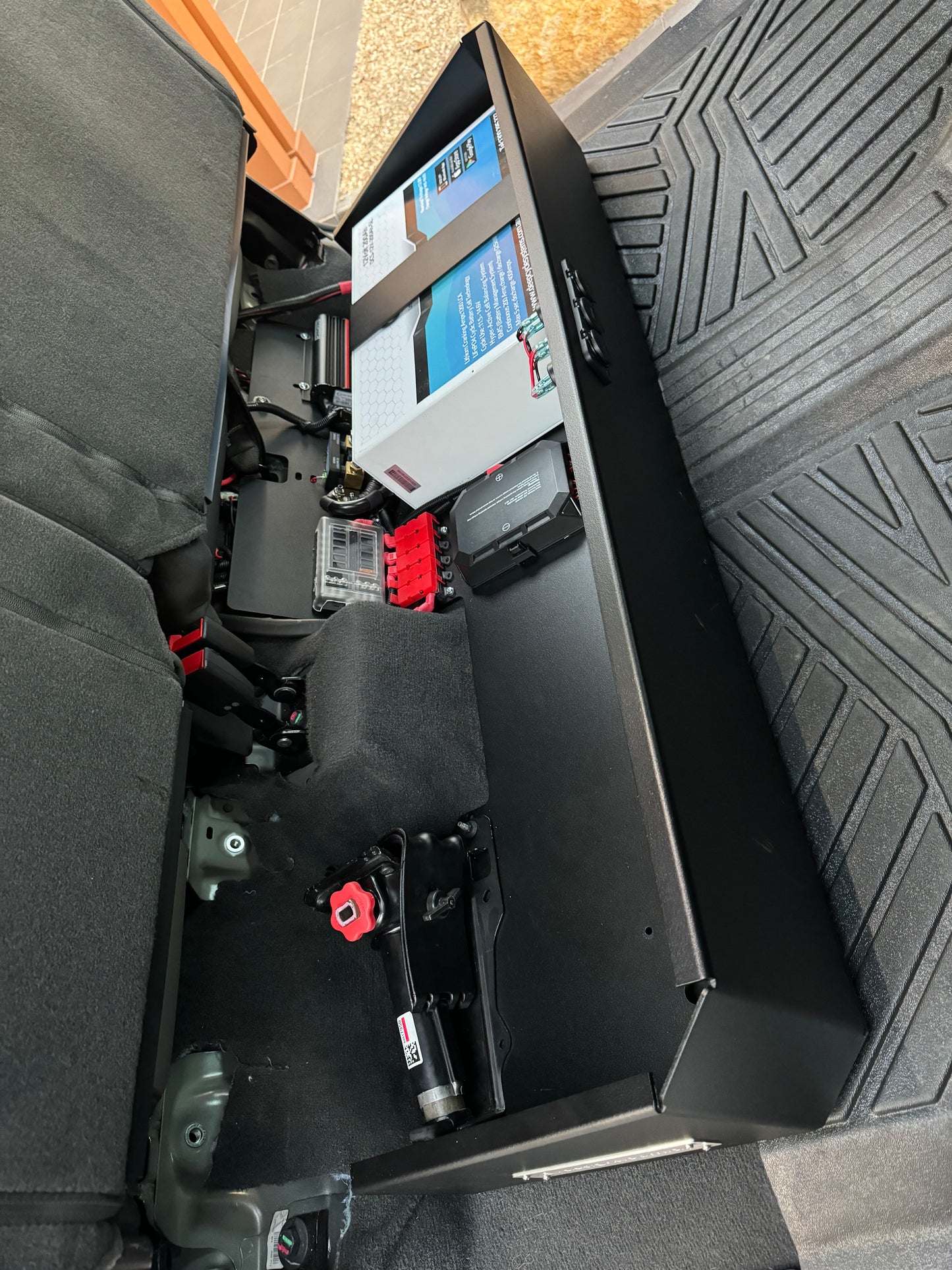 Complete Vehicle Designs under seat storage unit in Chevrolet Silverado 2019+ with DCS Lithium Battery & RedArc BCDC1250D
