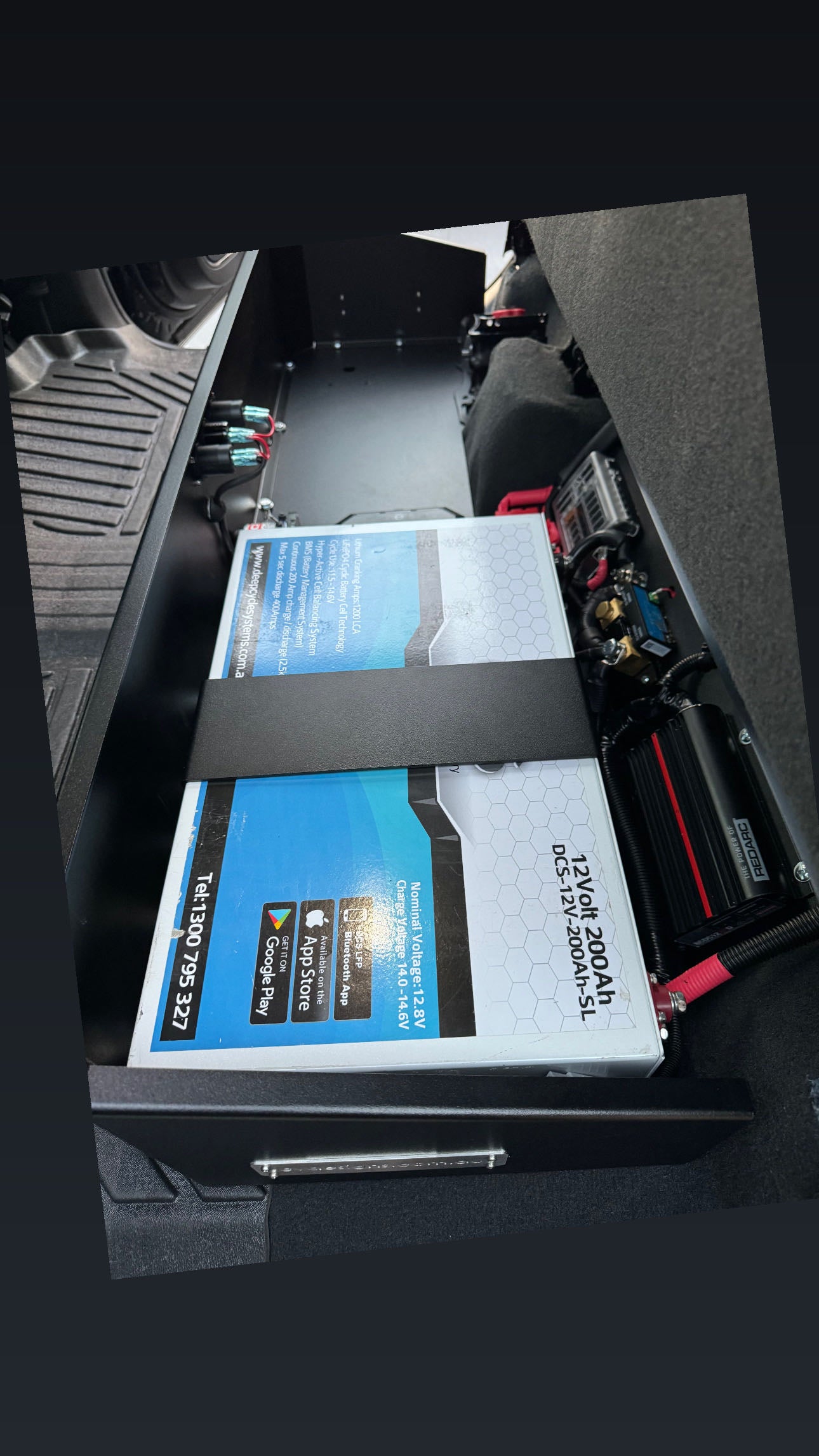 Complete Vehicle Designs under seat storage unit in Chevrolet Silverado 2019+ with DCS Lithium Battery & RedArc BCDC1250D