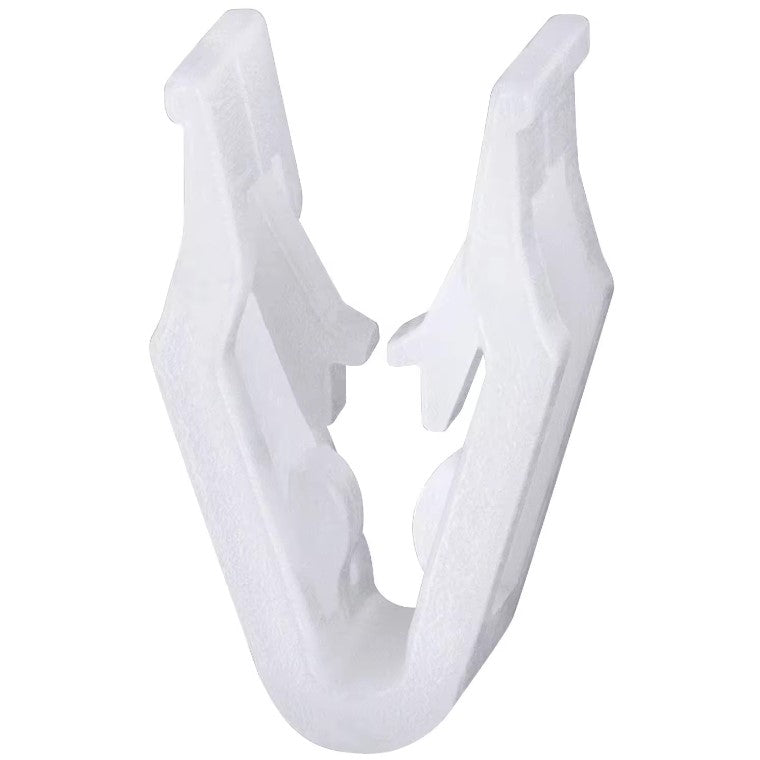 A white plastic interior trim clip for a vehicle.