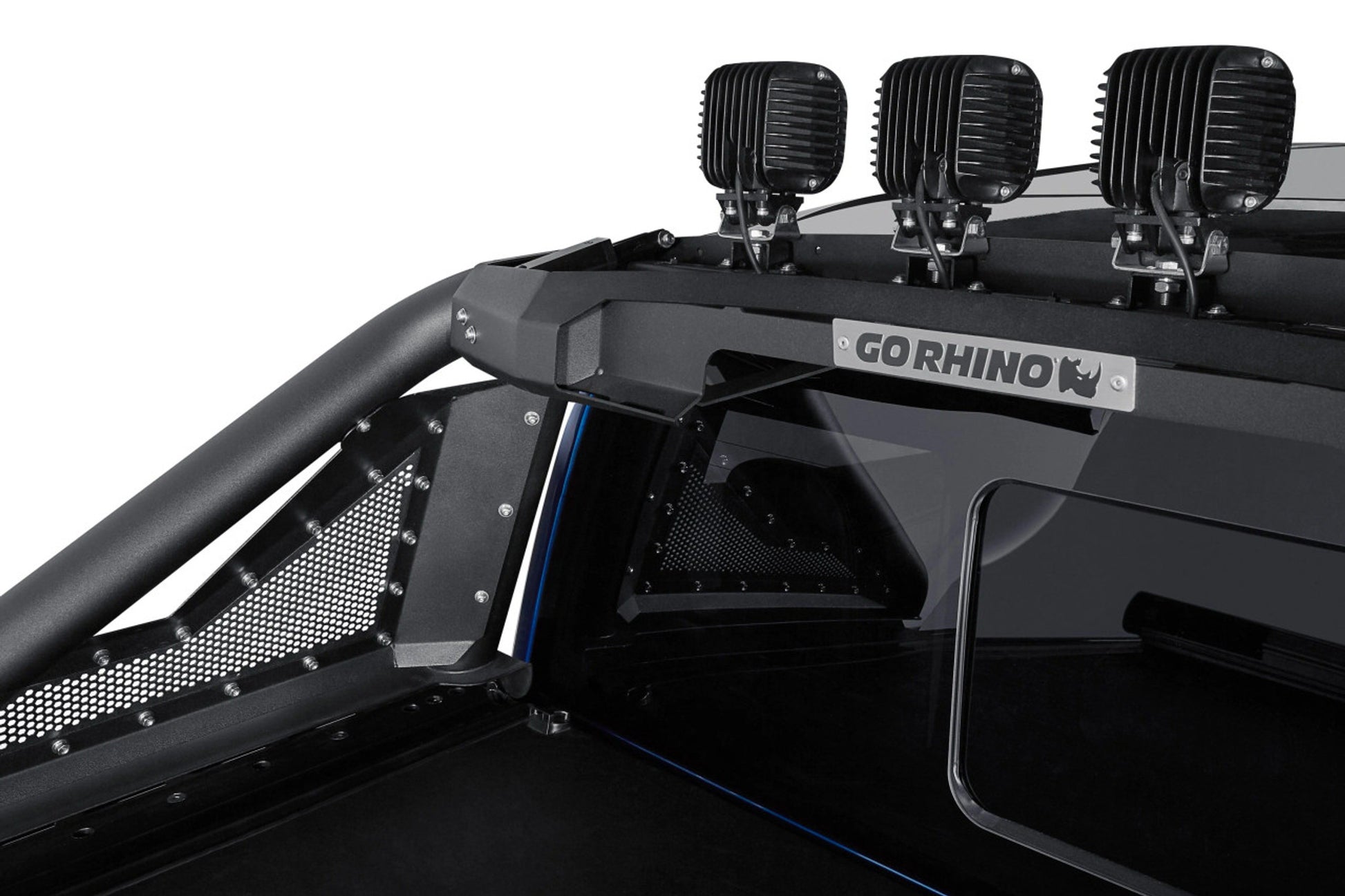 Close-up of a vehicle roll bar with mounted lights and 'Go Rhino' branding.