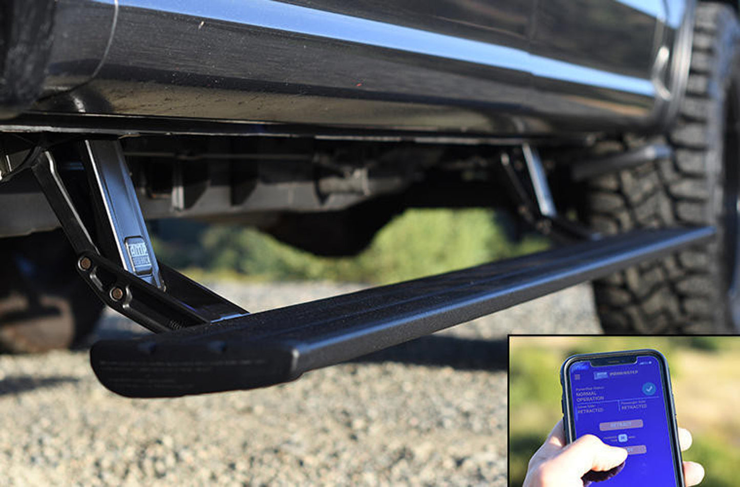 Close-up of a vehicle's step bar with an inset showing a smartphone app interface.
