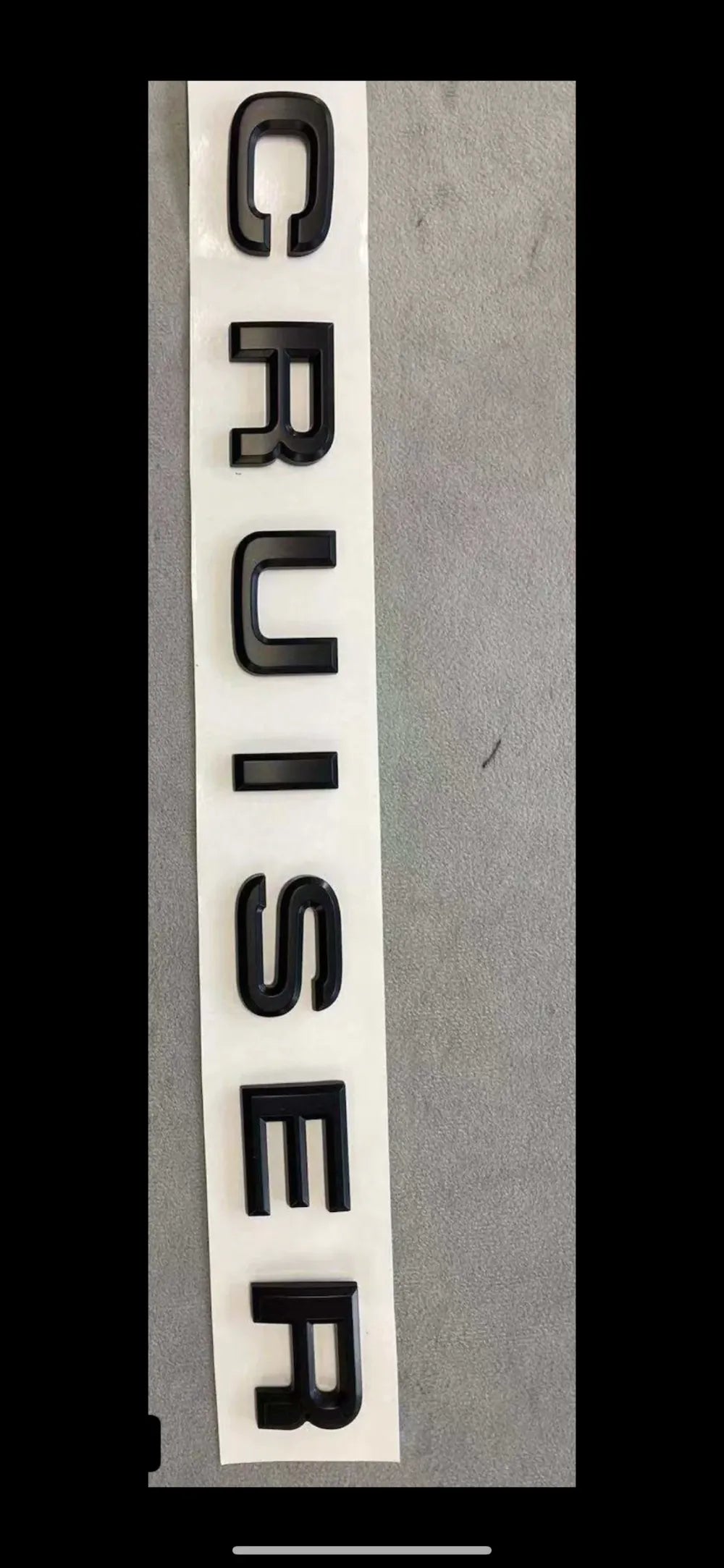 Cruiser badge - matte black finish self-adhesive 