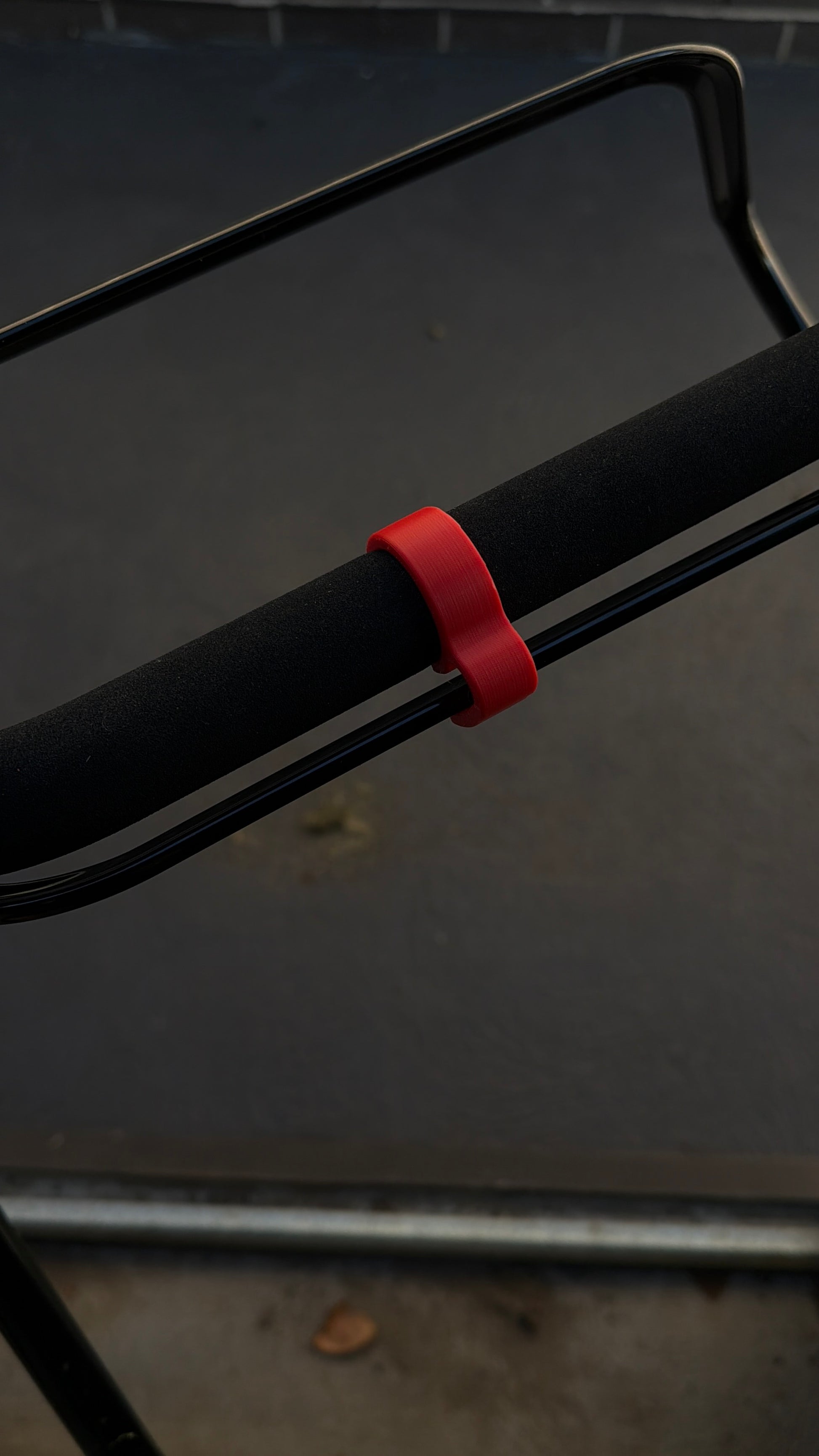 A Honda Walk Behind Lawn Mower with a 3D Printed Clip-on Brake Lever Holder